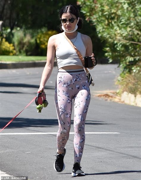 Lucy Hale Shows Off Her Toned Legs In A Pair Of Floral Leggings As She