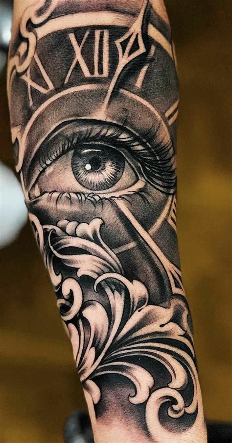 The Arm With An All Seeing Eye Tattoo On It And A Clock In The Background
