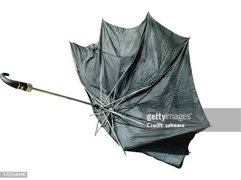 Broken Umbrella In Storm Photos And Premium High Res Pictures Getty