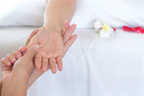 Hand Spa Massage Over Clean White Bed Background People Relax With Hand Massage Service Stock