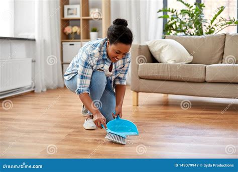 Happy Woman With Brush And Dustpan Sweeping Floor Stock Image Image