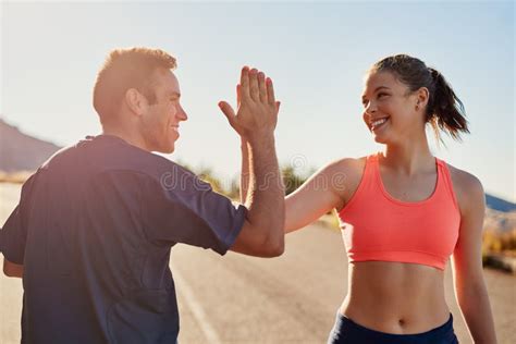 Lets Do This Two Young People High Fiving During Their Workout Stock