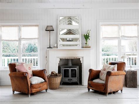 Pair Of Weathered Leather Armchairs Make All The Difference In This