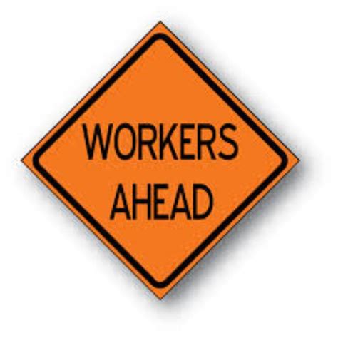 Workers Ahead Sign Clashing Pride