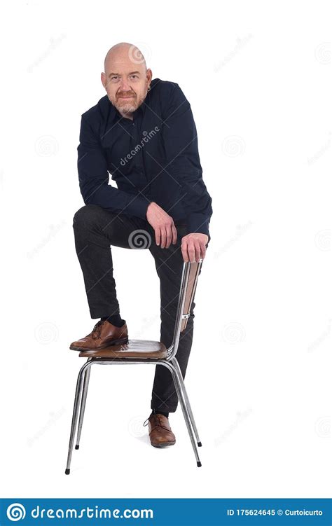 Man Standing With A Chair In White Background, Foot Over The Chair ...