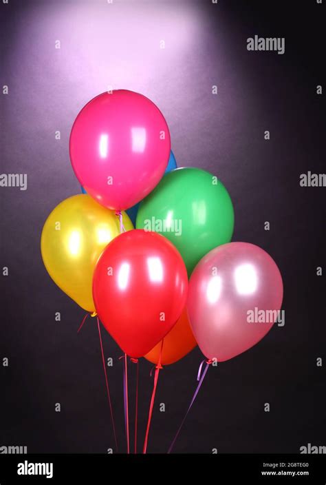 Bright Balloons On Purole Background Stock Photo Alamy