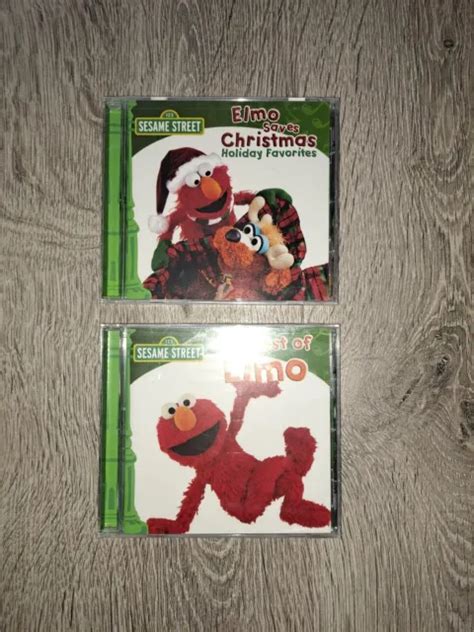 Sesame Street The Best Of Elmo Cd 2008 And Elmo Saves Christmas Cd New