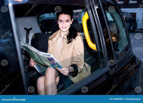 Female Passenger Reading Newspaper Inside Taxi Stock Image Image Of Femininity Rich 33496989