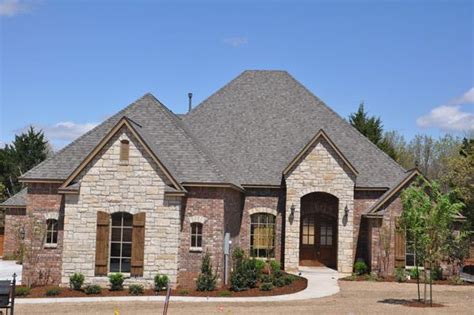 Curb Appeal Ways To Make Your House Stand Out Stone Exterior Houses Stone Houses Brick Stone
