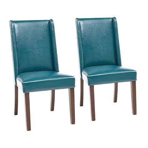 If your chair doesn't have removable covers, you can try cleaning the stain with a damp cloth. Oliver Teal Faux Leather Dining Chair Set of 2 - Pier1