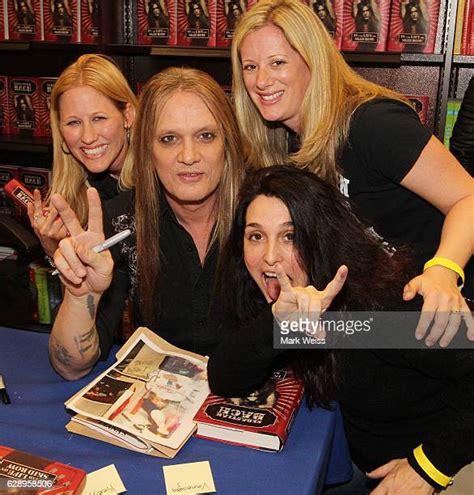 Sebastian Bach Signs Copies Of 18 And Life On Skid Row Photos Et Images