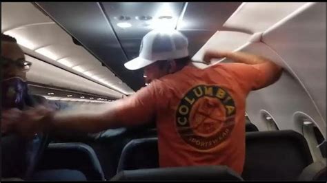 Belligerent Passenger Acts Out And Gets Taped To His Seat In Flight Reality Check Youtube