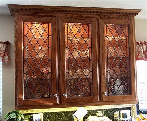 Here are a few steps to take when installing glass inserts into your center paneled cabinet door. kitchen photos with stained glass door
