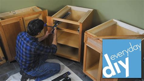 Most cabinets come with only one or two shelves, leaving a lot of wasted space. How to Install Kitchen Cabinets -- Buildipedia DIY - YouTube