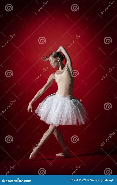 Ballerina Young Graceful Female Ballet Dancer Dancing At Red