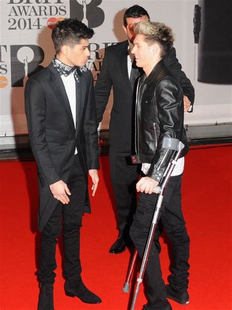 Niall Horan Arrives Using Crutches To The Brit Awards 2014 Brit