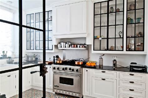 For those that suffer from design restlessness, they're there are many options for kitchen cabinet glass inserts: A Gallery of Glass Kitchen Cabinet Doors That Are Gorgeous ...