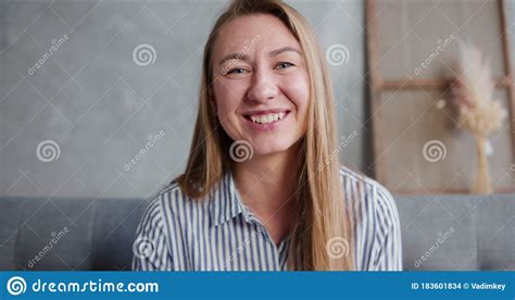 Portrait Of Happy Cheerful 30 35 Year Old Smiling Blonde Caucasian Woman Talking Looking At