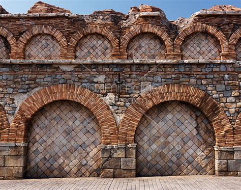 Photo Of Old Stone Wall With Brick Arches Texture Stock