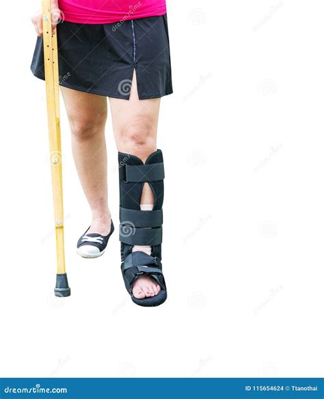 Injured Woman Broken Leg And Using Crutch For Walk Isolated On W Stock