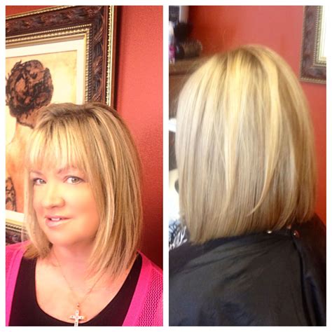 Maybe you would like to learn more about one of these? Long bob with light layers, slightly inverted. Great for ...