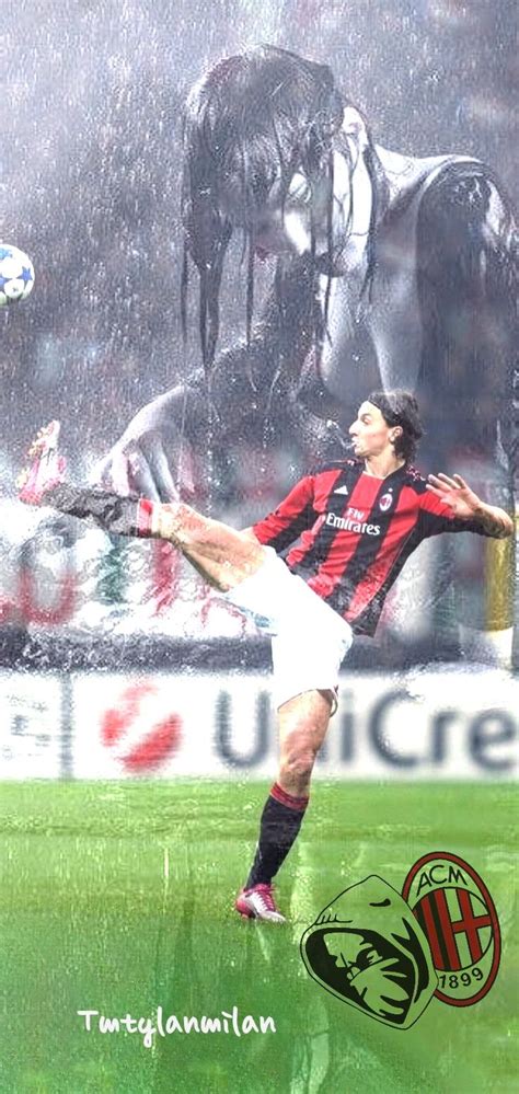 A Man Kicking A Soccer Ball On Top Of A Field In Front Of An Alien Creature