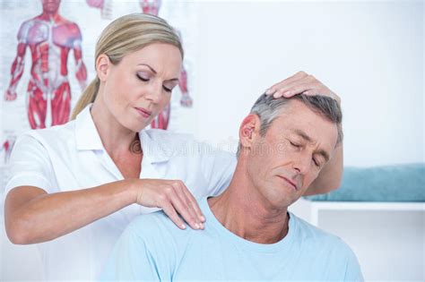 Doctor Examining Her Patient Neck Stock Image Image Of Health