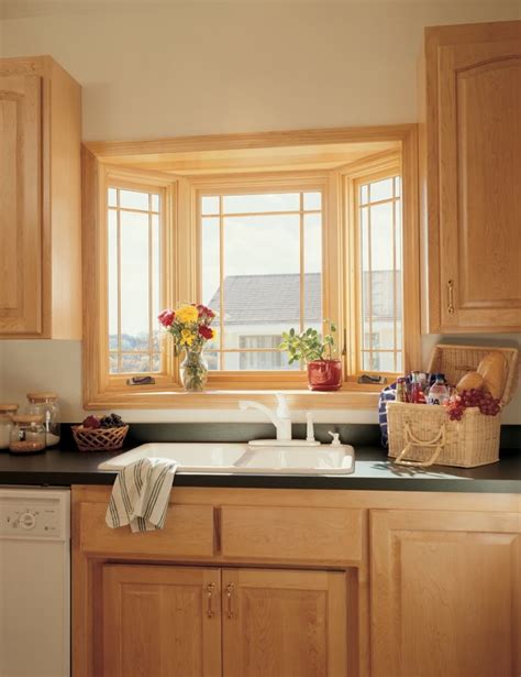 This is a guide about frugal kitchen window covering ideas. The Ideas of Kitchen Bay Window Treatments - TheyDesign ...