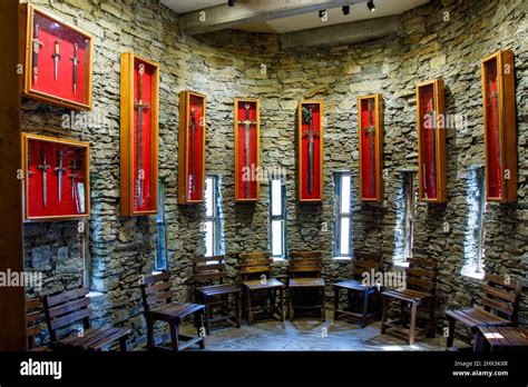 interior room view sword display cases loveland castle chateau laroche medieval style castle