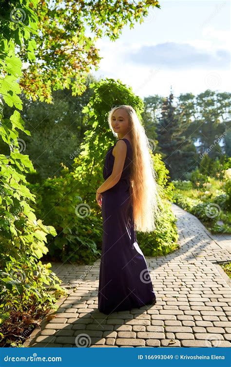 Pretty Teenage Girl 14 16 Year Old With Curly Long Blonde Hair In