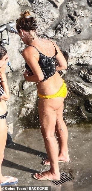 Emma Watson Opts For Mismatched Bikini As She Relaxes On The Beach In