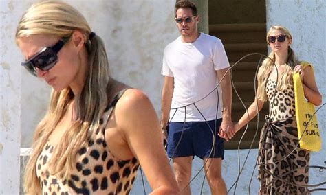 Paris Hilton Slips Into A Sexy Leopard Swimsuit To Hang By The Pool