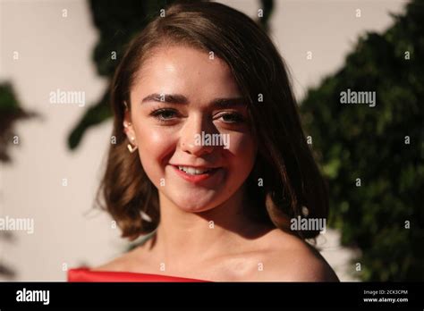 British Actress Maisie Williams Poses For Photographers At The Evening