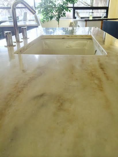 Corian solid surface countertops offer endless benefits and survive the impact, nicks and cuts that can occur with daily wear and tear. Corian® Witch Hazel - the lighting is bad in this picture ...