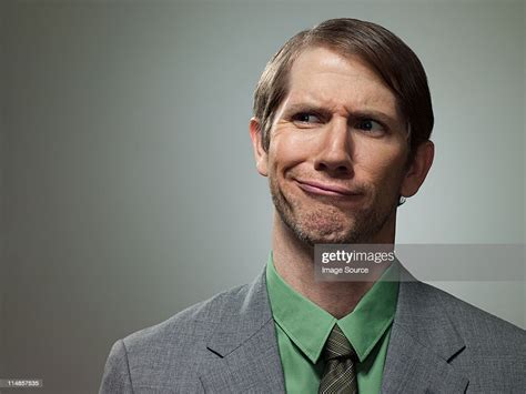 Confused Mid Adult Businessman Portrait High-Res Stock Photo - Getty Images