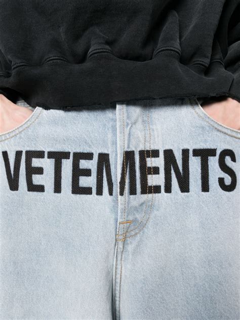 Vetements Logo Print Baggy Jeans Farfetch