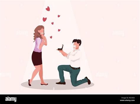Man Kneeling Holding Engagement Ring Proposing To Surprised Woman Marry Him Happy Valentines Day