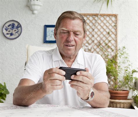 Older Man Using Cell Phone Stock Image F0042399 Science Photo