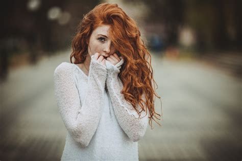 Women Redhead Freckles Long Hair Curly Hair Hair In Face Looking At Viewer White Sweater