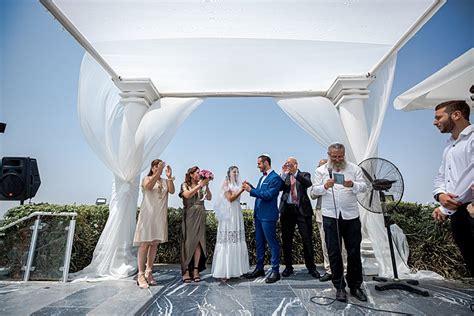 The accident was reportedly triggered when guests stood under that wall to protect themselves from heavy rains and thunderstorm. Shira and Ofek, Kedma Hall, Israel_0100 - Smashing the ...
