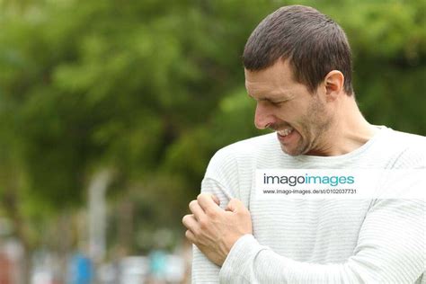 Man Suffering Itching Cratching Arm