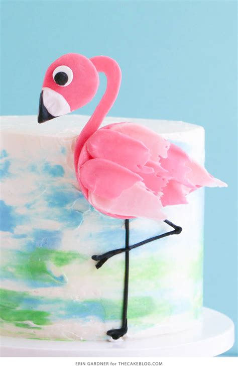 Tint 3½ cups icing light pink and ¼ cup icing dark pink by combining rose and orange icing colors to get light and dark pink colors shown. Flamingo Cake