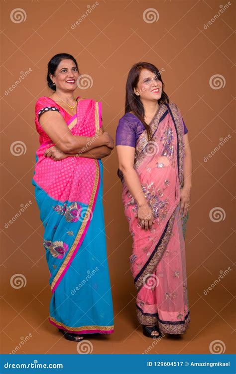 Two Mature Indian Women Wearing Sari Indian Traditional Clothes Stock Image Image Of Asian
