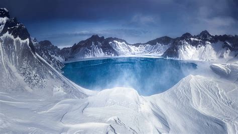 Chinas Largest Volcanic Crater Lake Starts To Thaw Cgtn