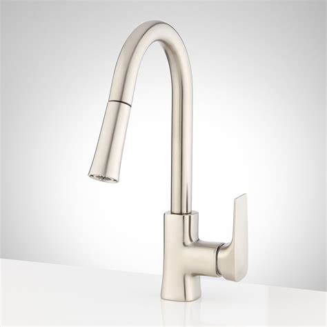 If you really have your heart set on a single hole faucet (and there are some beautiful options) but you have a three or four hole sink, you can always install a base plate. Sharma Single-Hole Pull-Down Kitchen Faucet - Kitchen