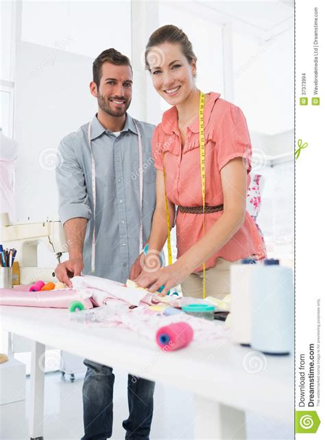 Fashion Designers At Work In Bright Studio Stock Photo Image Of