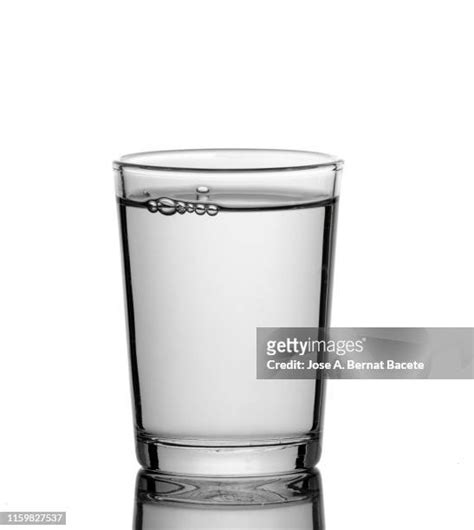 water droplet on white table photos and premium high res pictures getty images