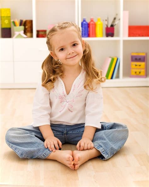Little Girl Is Sitting On The Floorthe Concept Of A Happy Child Stock 219