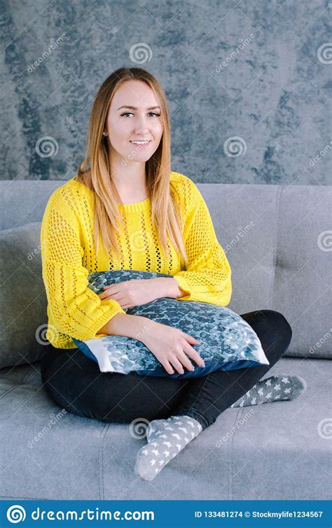 Beautiful Girl Sitting On The Sofa Stock Photo Image Of Happy Drink