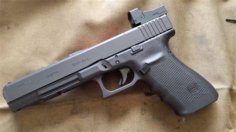 Glock 40 With Extended Clip And Laser